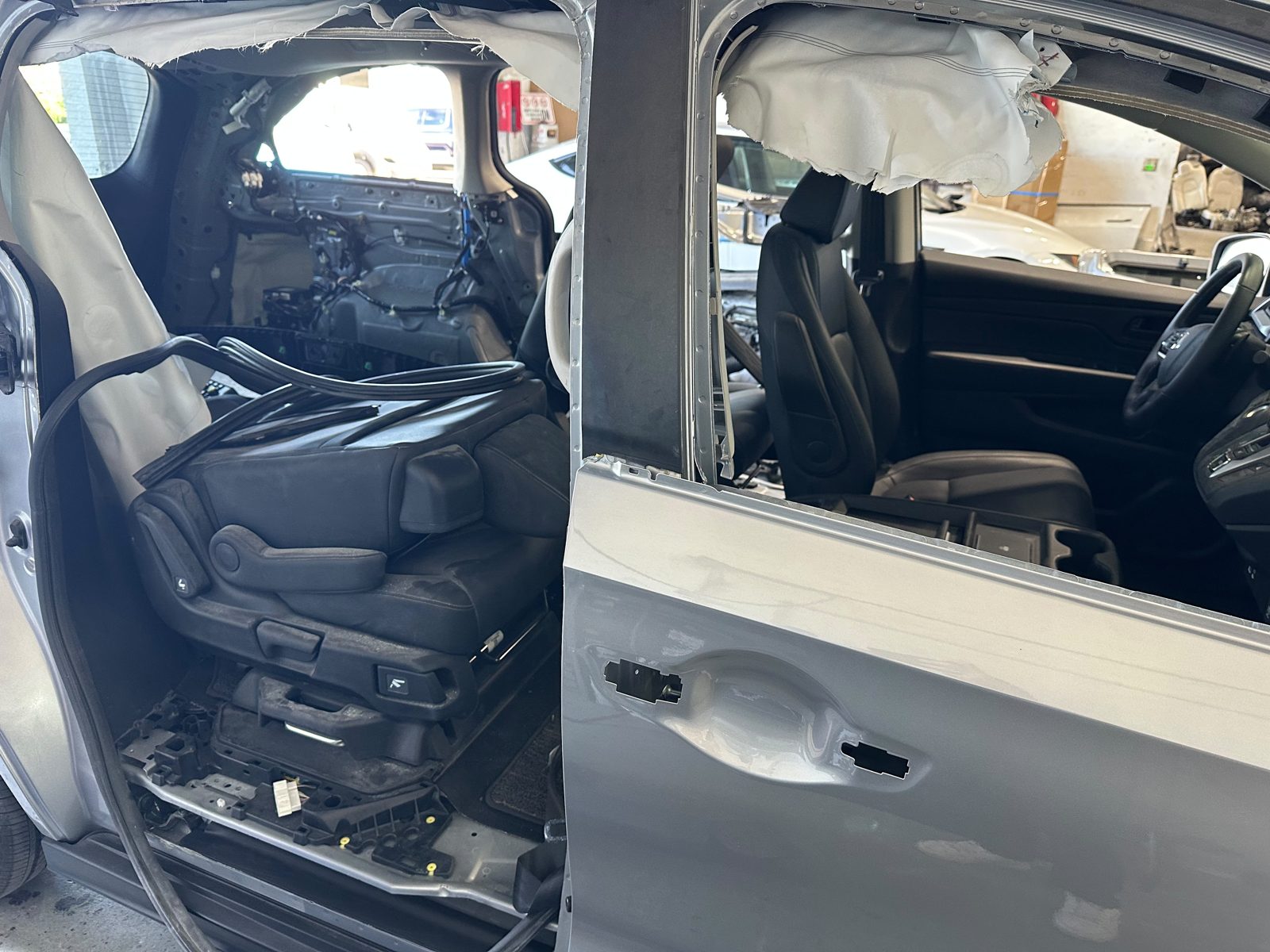 Minivan interior during collision repair